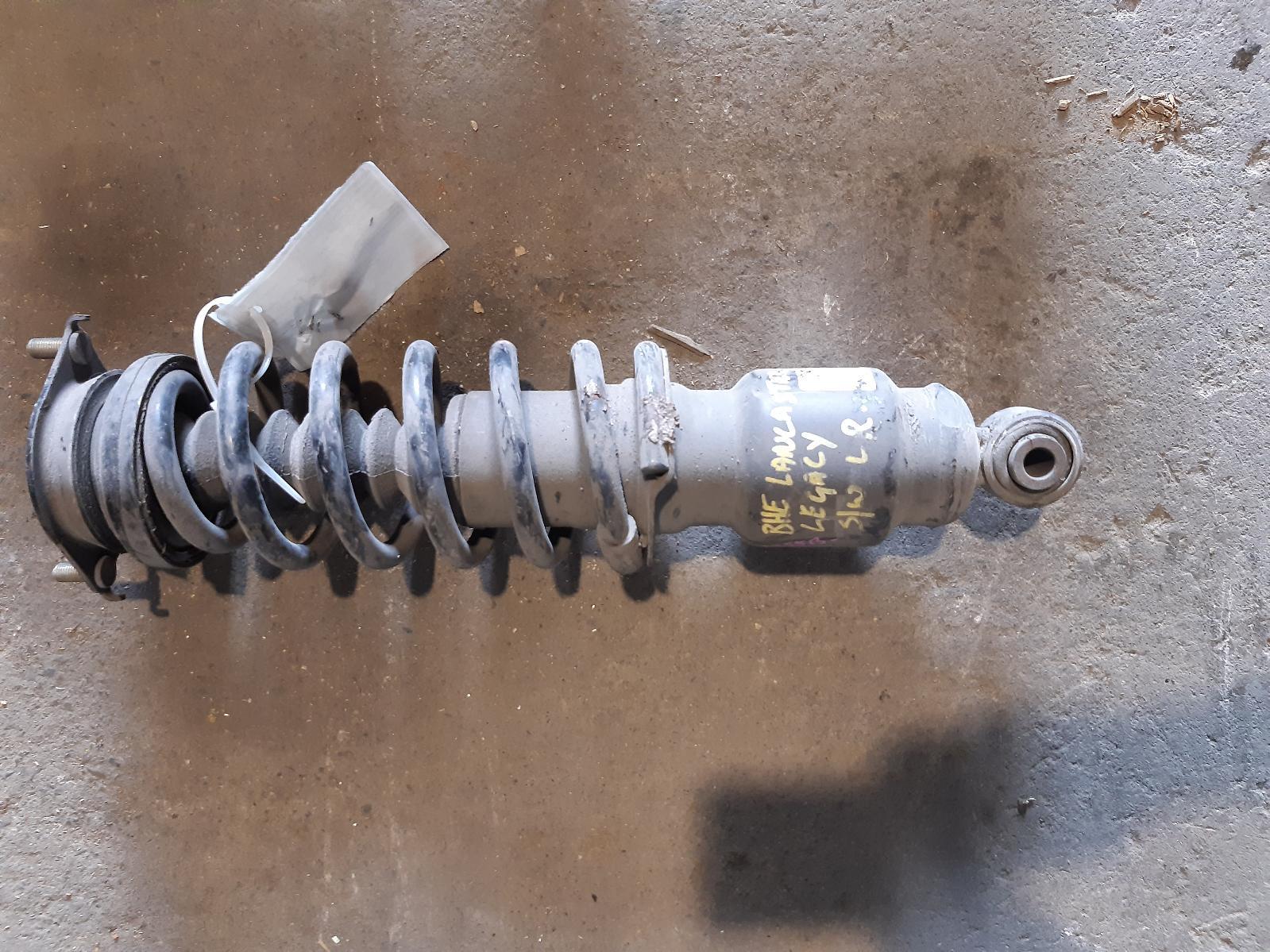 View Auto part Left Rear Strut SUBARU LIBERTY 2001